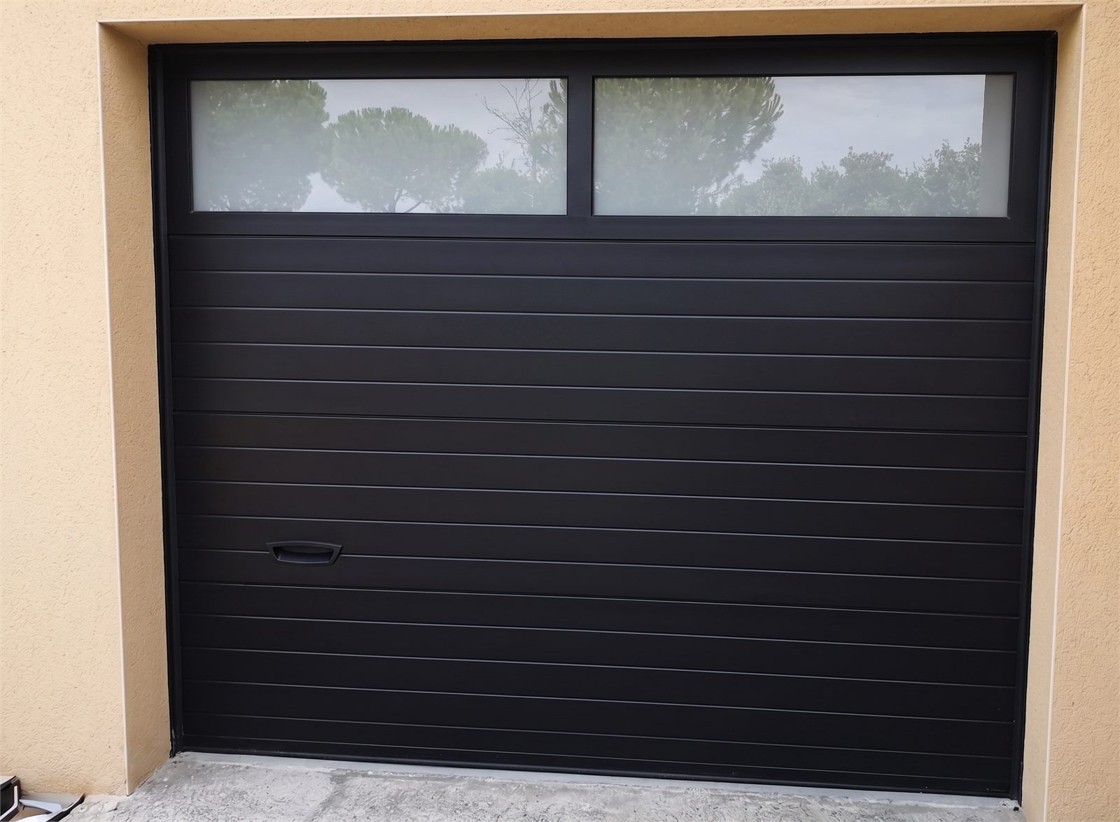 Modern Florida home with an impact-rated garage door
