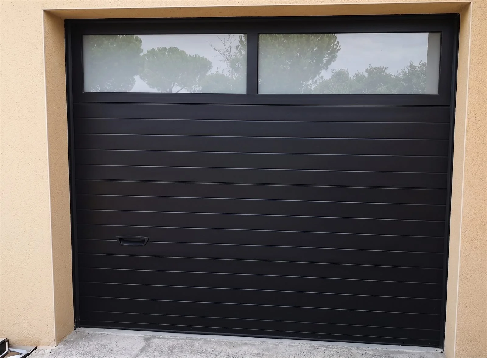 Modern Florida home with an impact-rated garage door